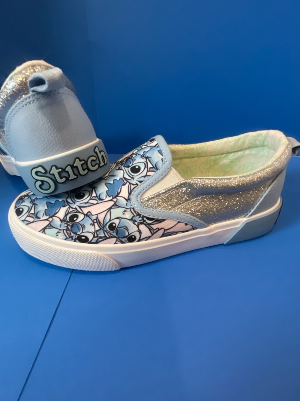 NWOT Slip-On Kids Sneakers with Stitch Character Print and Silver Glitter